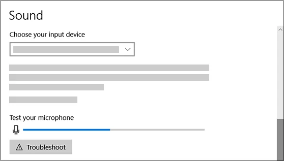 Microsoft Windows 10 Sound settings screenshot showing Choose your input device and the Test your microphone level meter